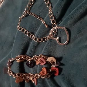 Heart bracelets button hearts .and silver tone floating hearts.